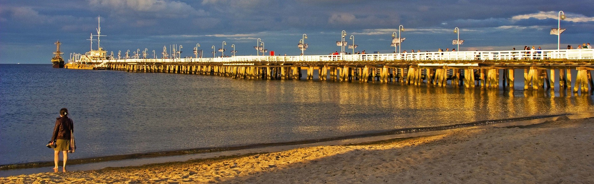 The wooden pier and beach in Sopot.