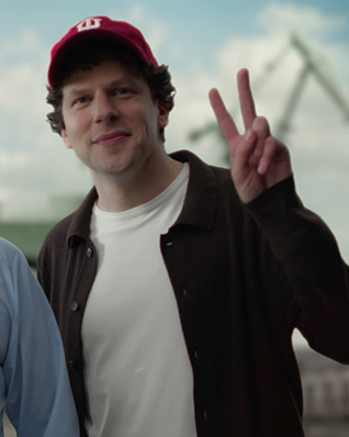 Jesse Eisenberg against the port cranes in Gdańsk.